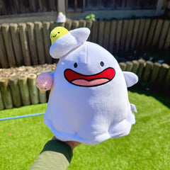 Happy ghost plush in the garden