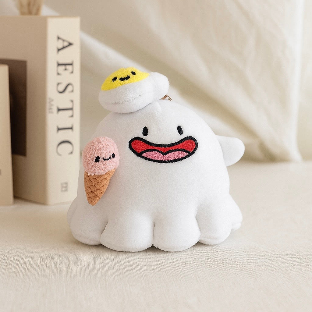 Ghost keychain plush with fried egg and ice cream on beige background