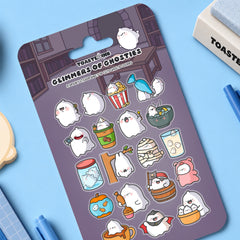Ghost sticker sheet placed on blue desk with stationery