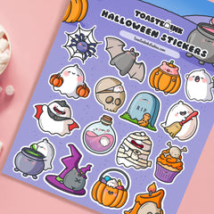 Halloween stickers close up on pink desk