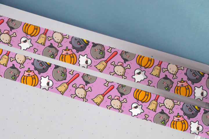 Halloween washi tape on blue background and notebook