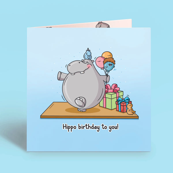 Hippo birthday card on blue table