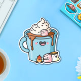 Hot chocolate with marshmallows vinyl sticker on blue table