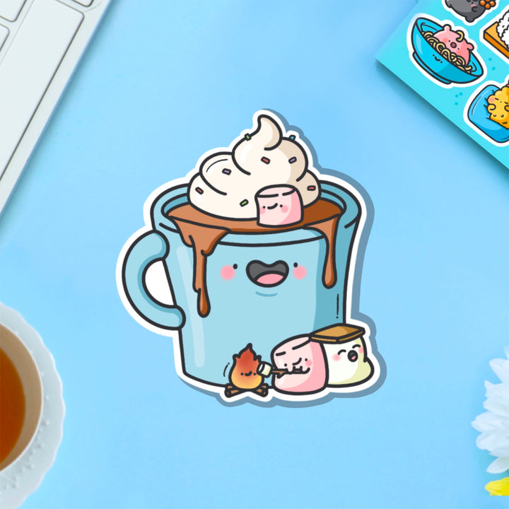 Hot chocolate with marshmallows vinyl sticker on blue table