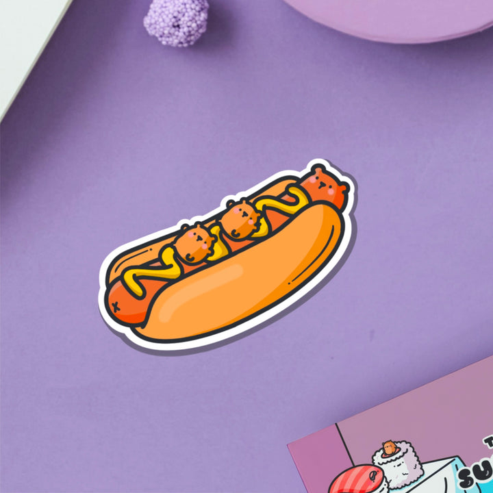 Hot Dog Bear Vinyl sticker on purple table