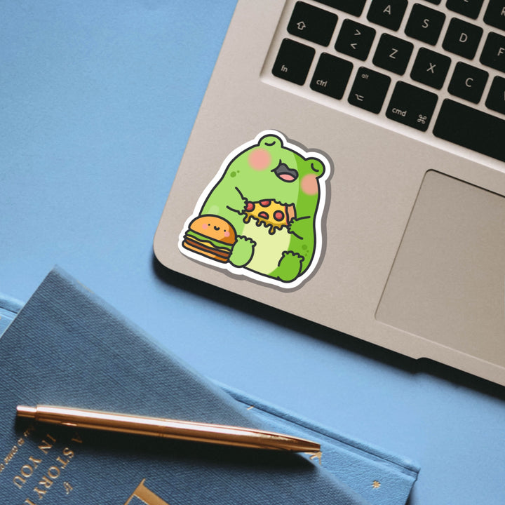 Frog eating pizza vinyl sticker on laptop