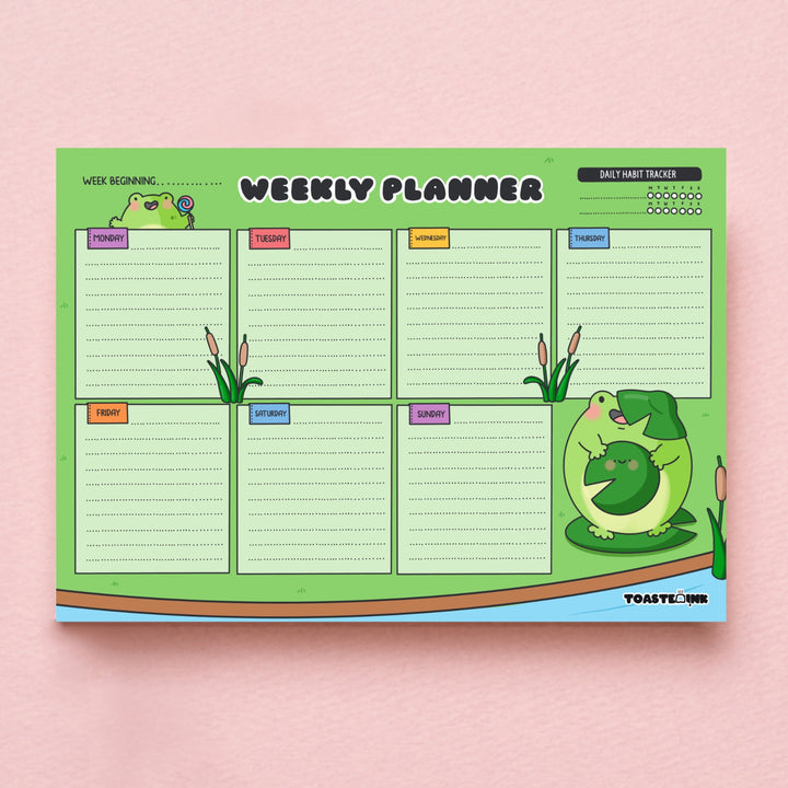 Frog weekly planner on pink background