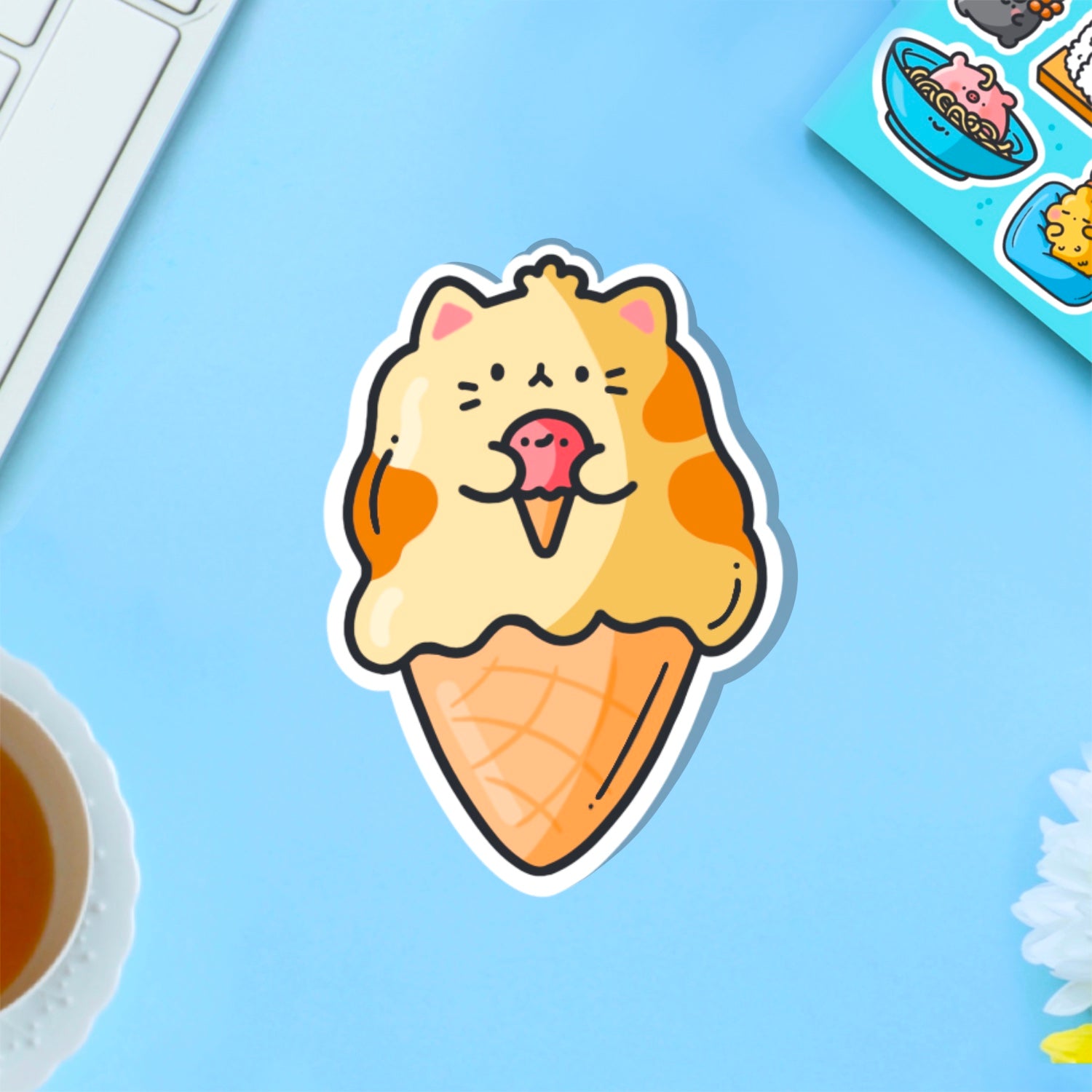 cat as ice cream vinyl sticker on blue table