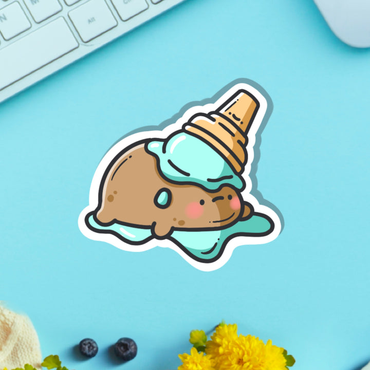 Potato in ice cream vinyl sticker on blue table with keyboard
