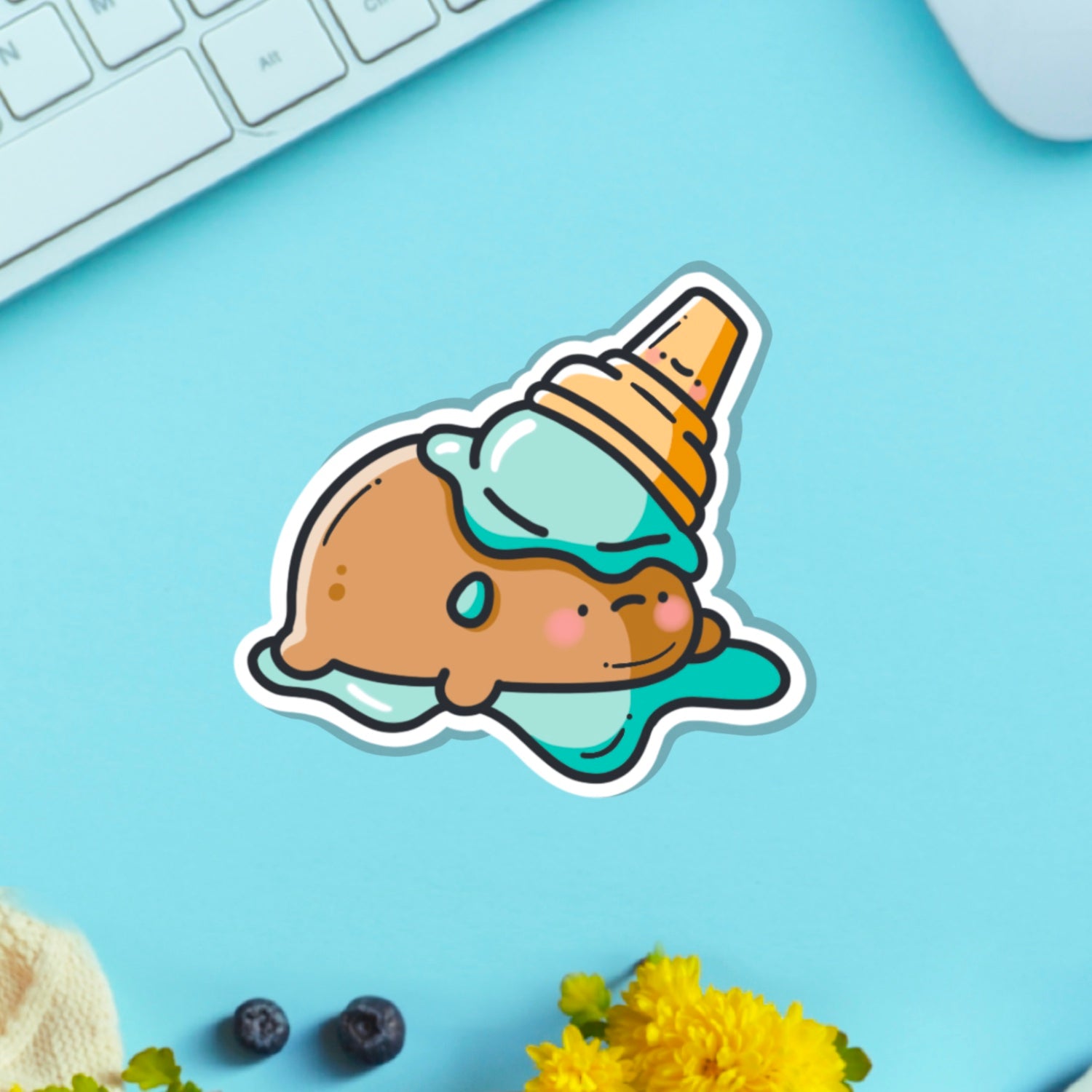 Potato in ice cream vinyl sticker on blue table with keyboard