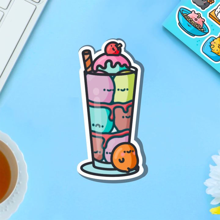 Ice cream sundae vinyl sticker on blue table