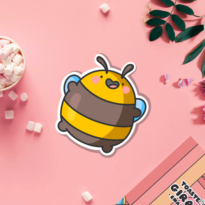 Jumping bee vinyl sticker on pink table