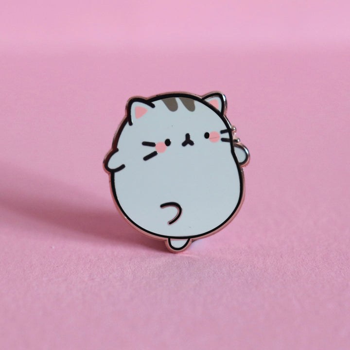 Grey Kitty Cat Enamel Pin on pink desk