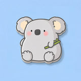 Koala shaped sticky notes on blue table