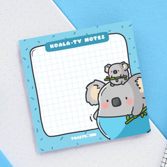 Koala sticky notes on white and blue table