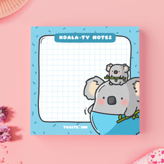 Koala sticky notes on pink table