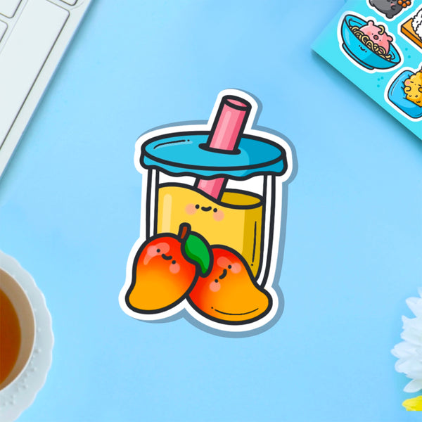 Mango bubble tea vinyl sticker on blue table