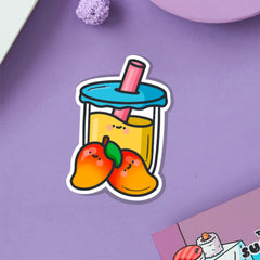 Mango bubble tea vinyl sticker on purple table