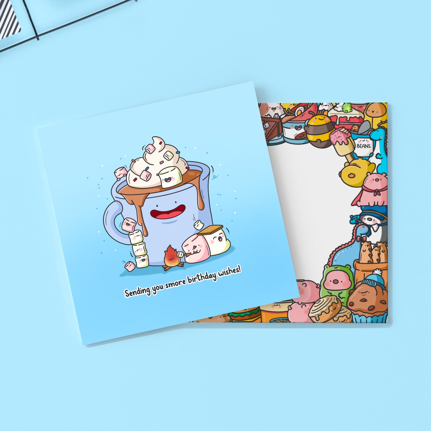 Marshmallow greeting card with a blue background and Toastedink envelope