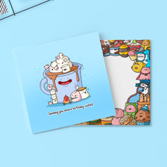 Marshmallow greeting card with a blue background and Toastedink envelope