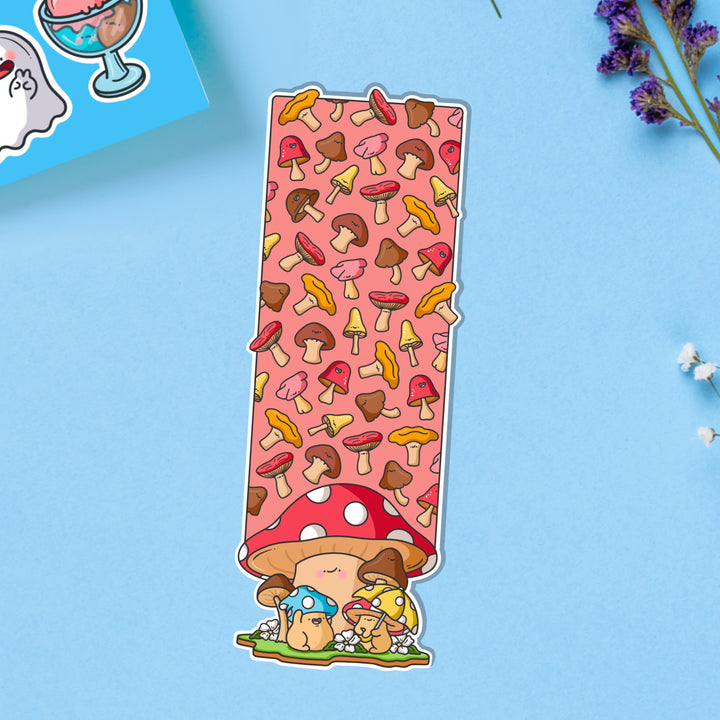 Mushroom bookmark on blue table with stickers