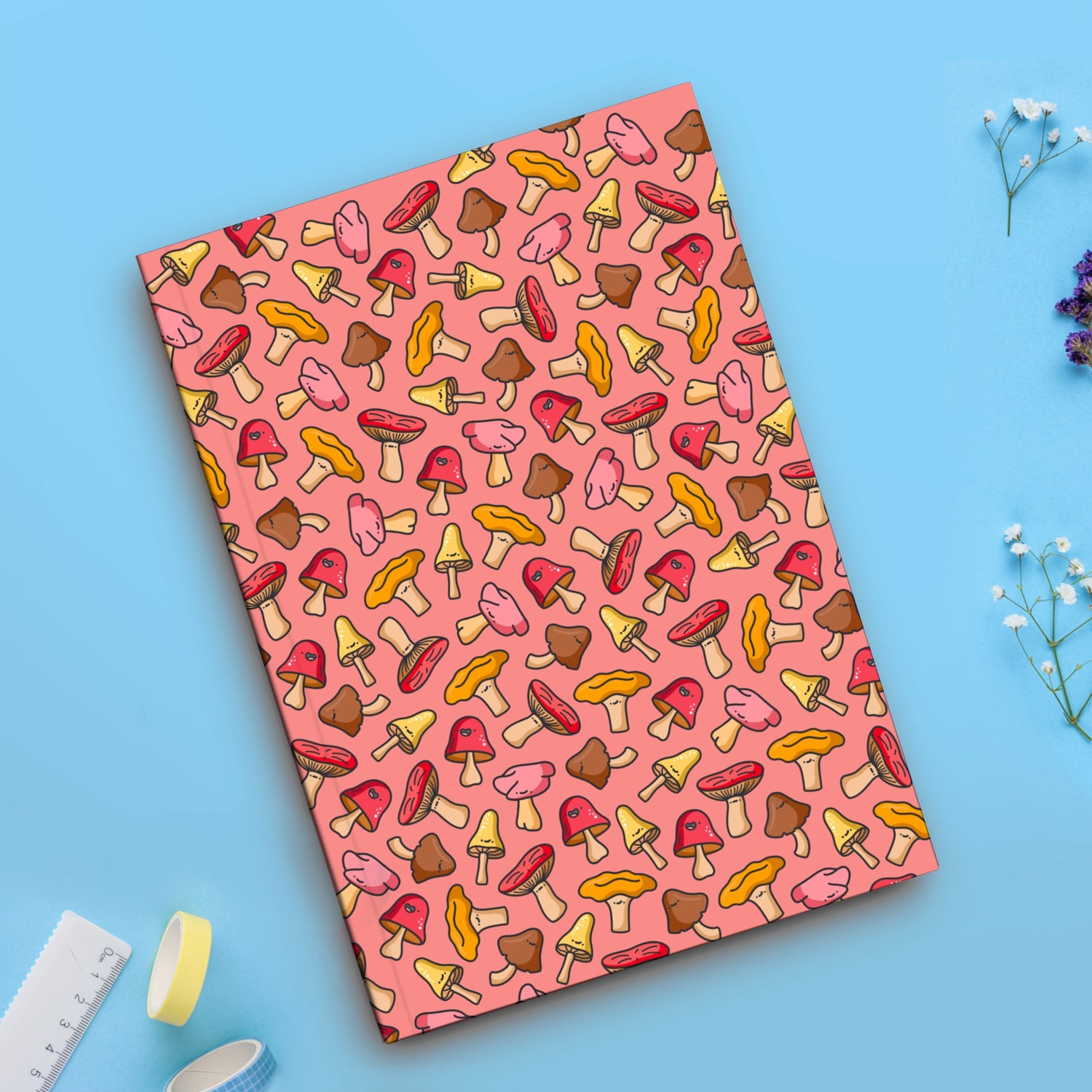 Mushroom notebook on blue table