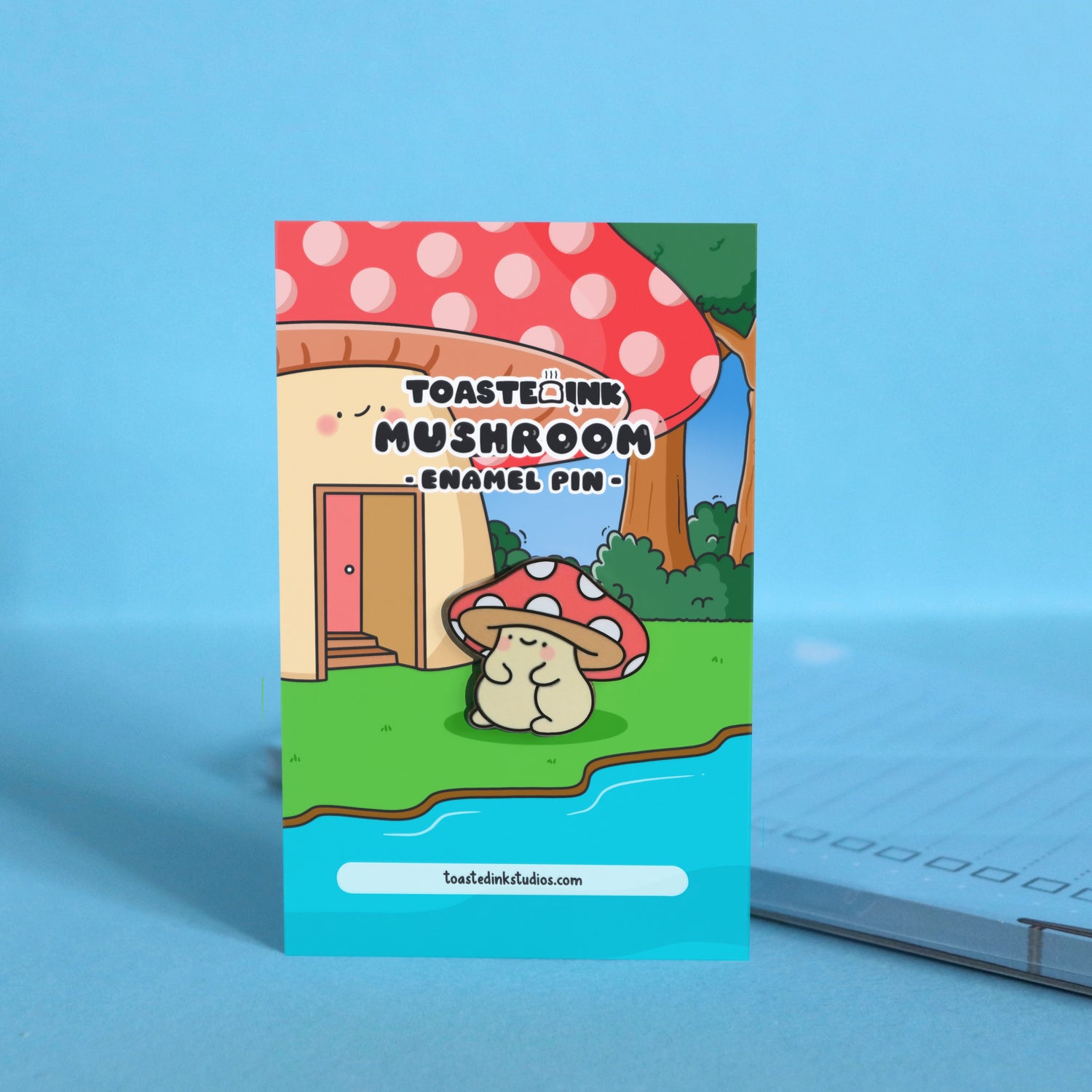 Mushroom enamel pin on forest backing card
