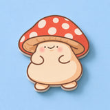 Mushroom shaped sticky notes on blue table