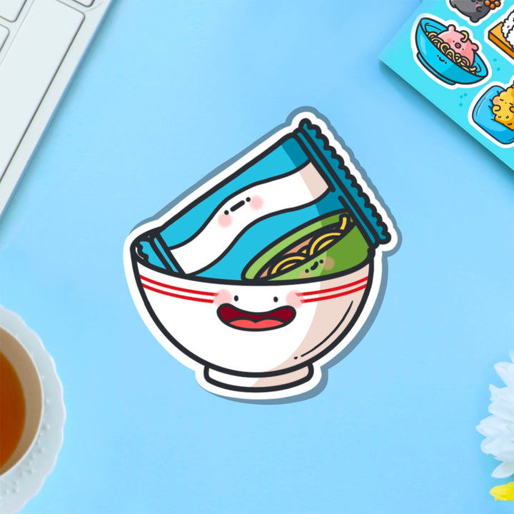 Packet of ramen vinyl sticker on blue table