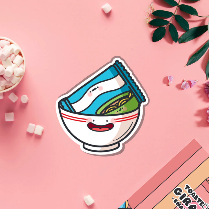 Packet of ramen vinyl sticker on pink table