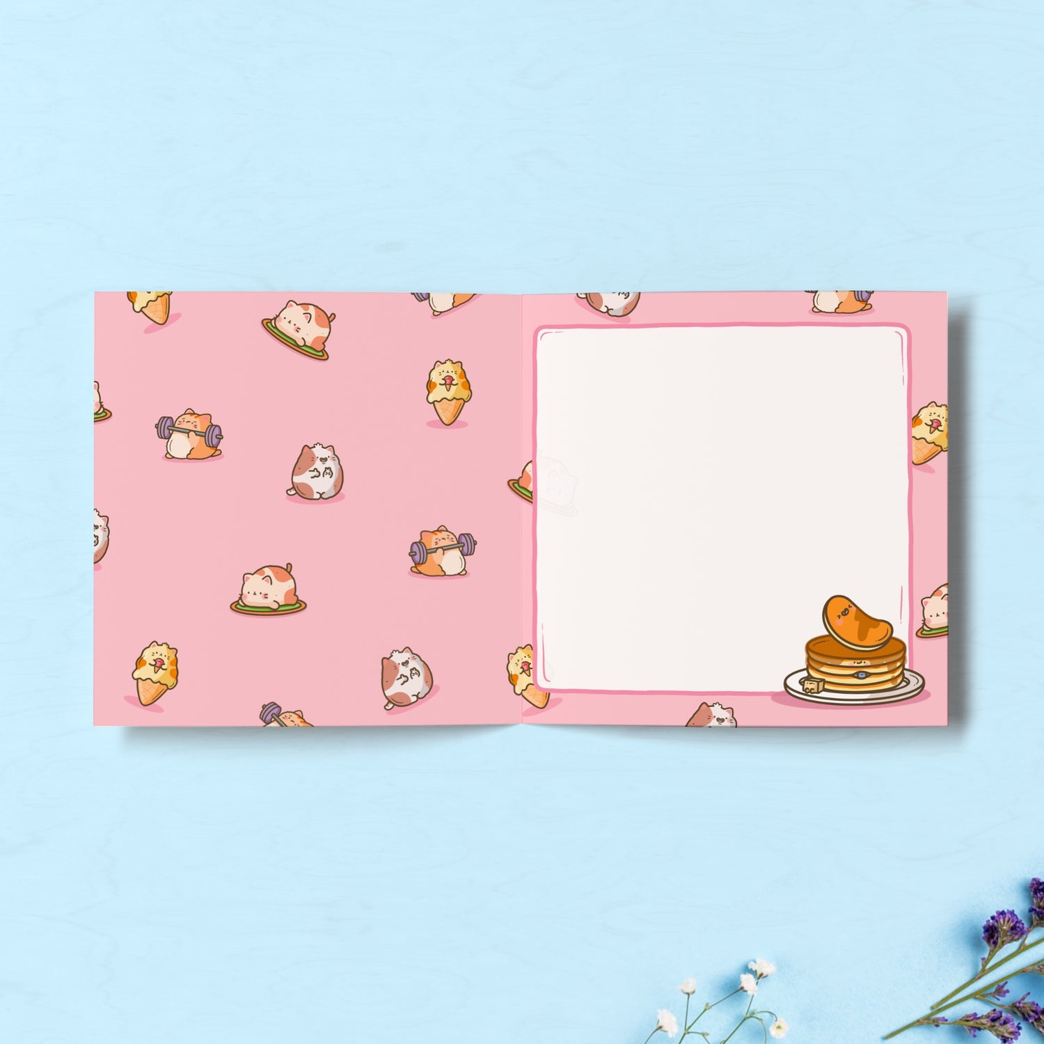 Cat print inside card on blue table