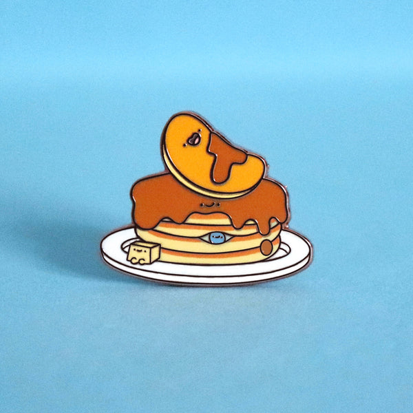 Pancakes enamel pin on blue table