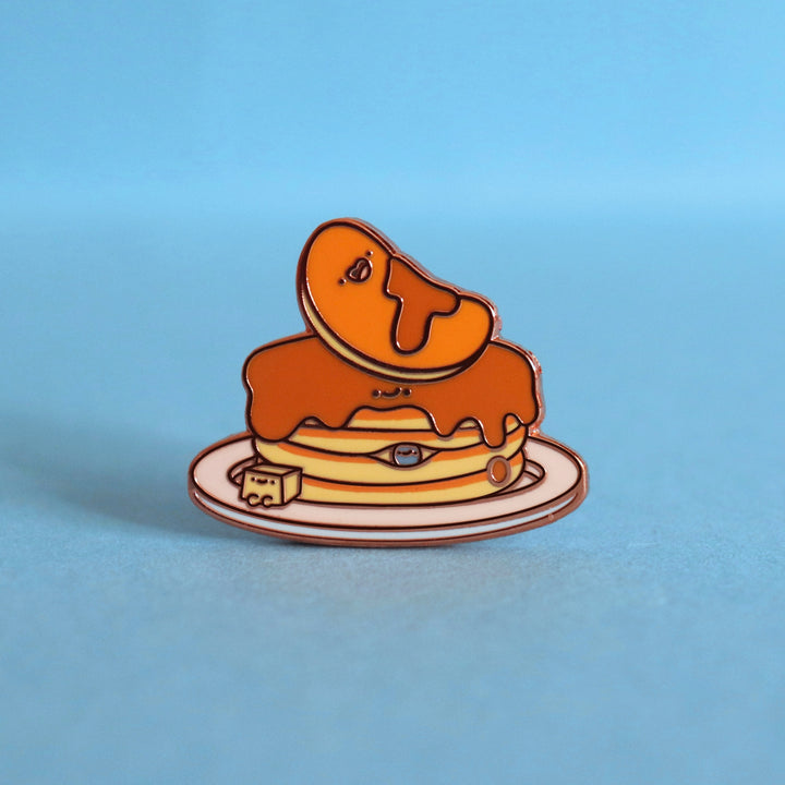 Pancakes enamel pin on blue table