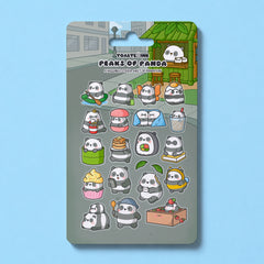 Panda sticker sheet on blue table 