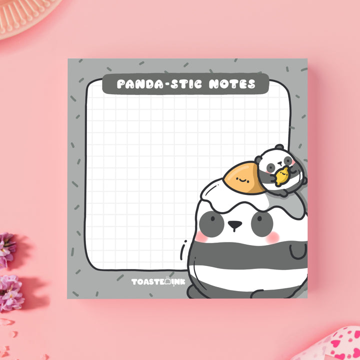 Panda sticky notes on pink table