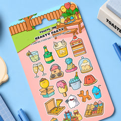 Party sticker sheet on blue desk with stationery