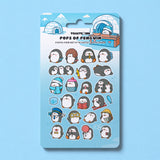 Penguin sticker sheet with whimsical characters on blue desk