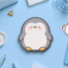 Penguin sticky notes on blue table