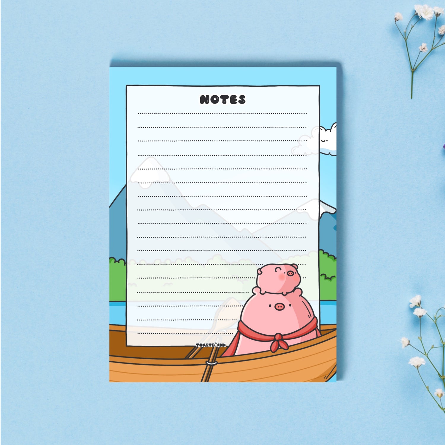 A6 Pig Notepad on blue desk