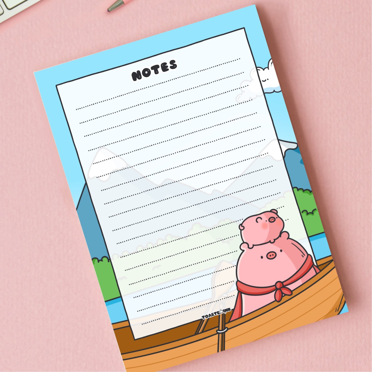 A6 Pig Notepad on pink desk close up