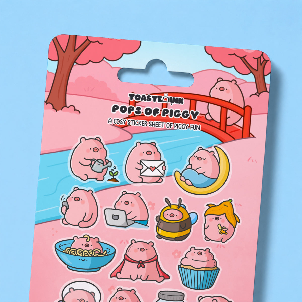 Close up of pig sticker sheet on blue desk