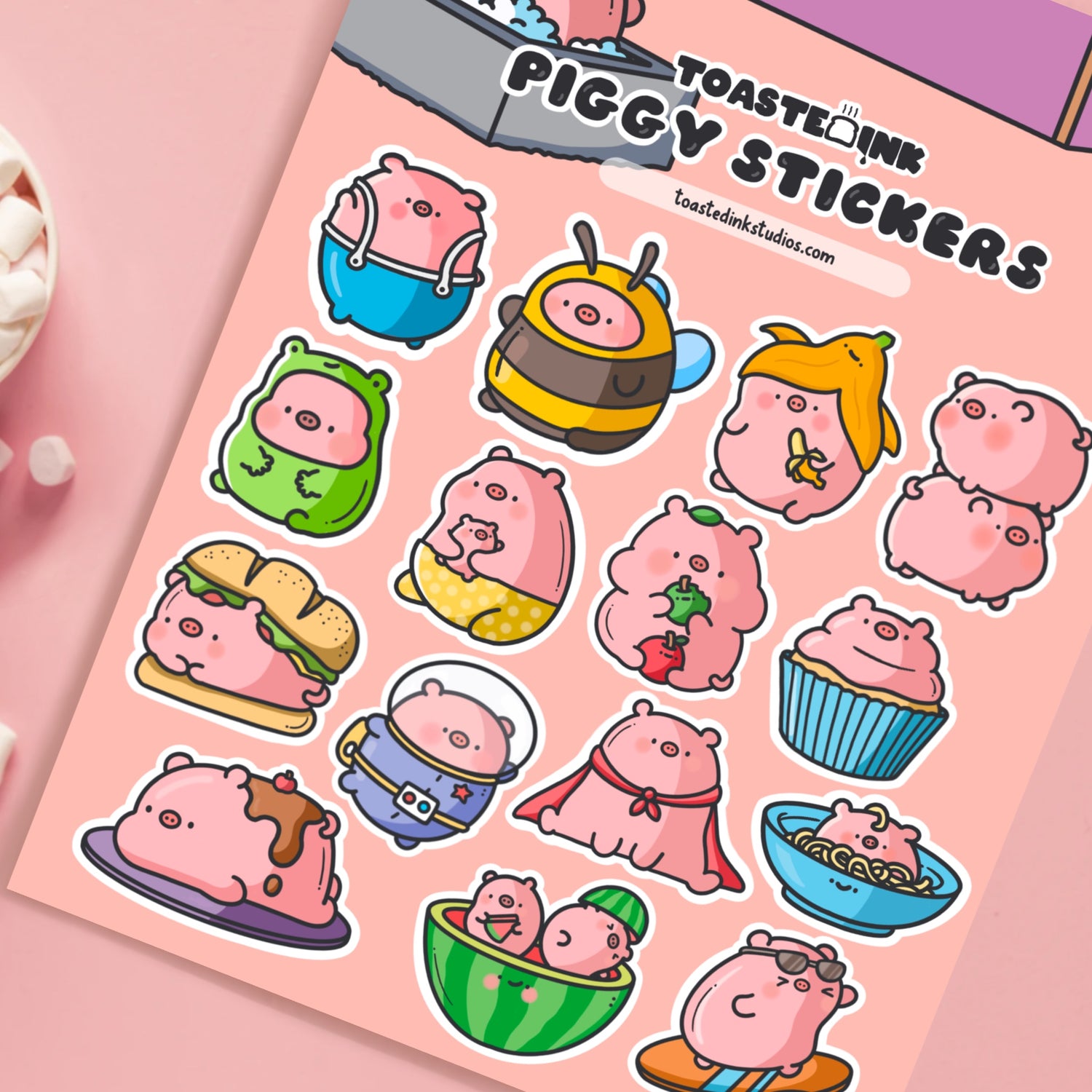 Pig sticker sheet close up on pink desk
