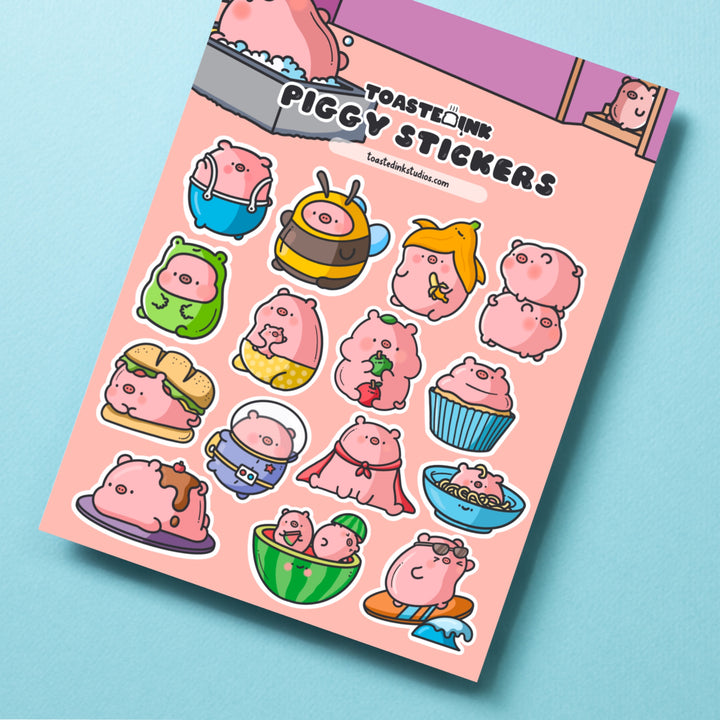 Pig sticker sheet on turquoise table