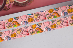 Pig washi tape on pink table and notebook