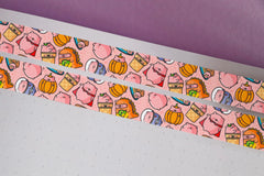 Pig washi tape on notebook and purple desk