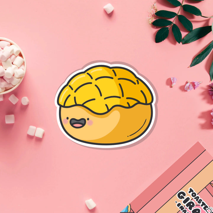 Pineapple bun vinyl sticker on pink table