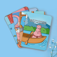 Three positivity cards on blue table with flower