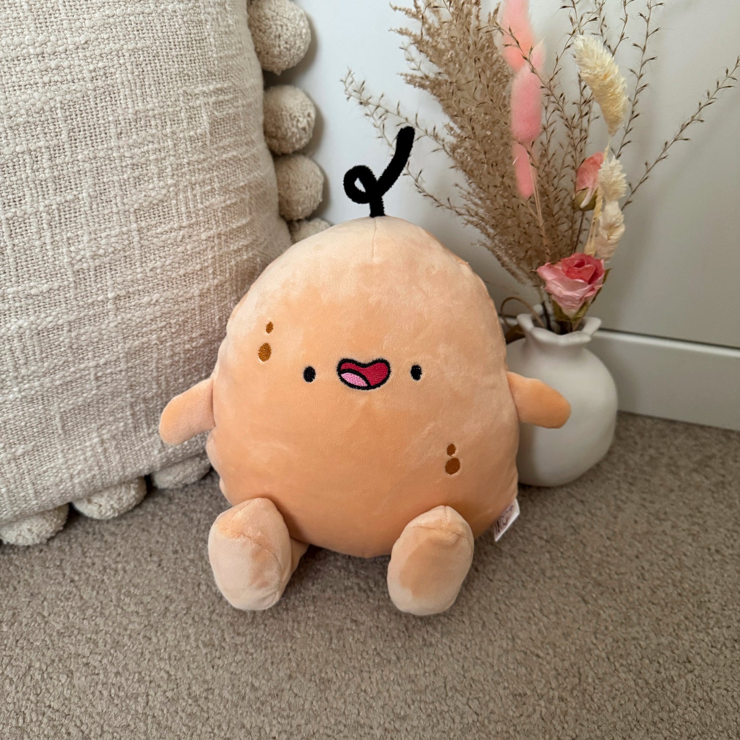 Potato plush with flowers