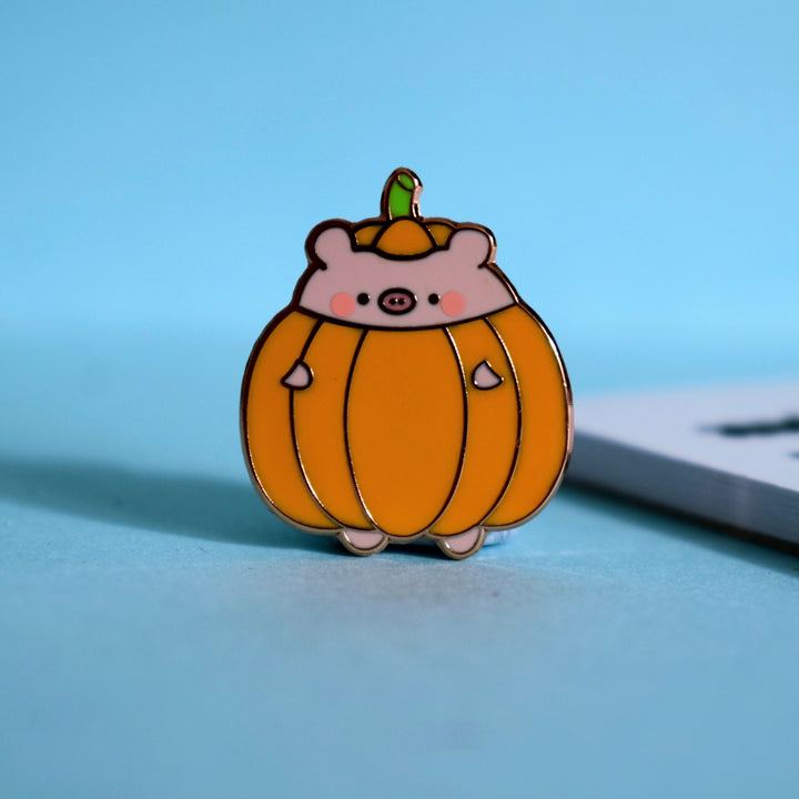 Pig dressed as a pumpkin pin