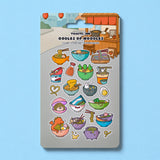 Ramen noodles sticker sheet on blue desk background